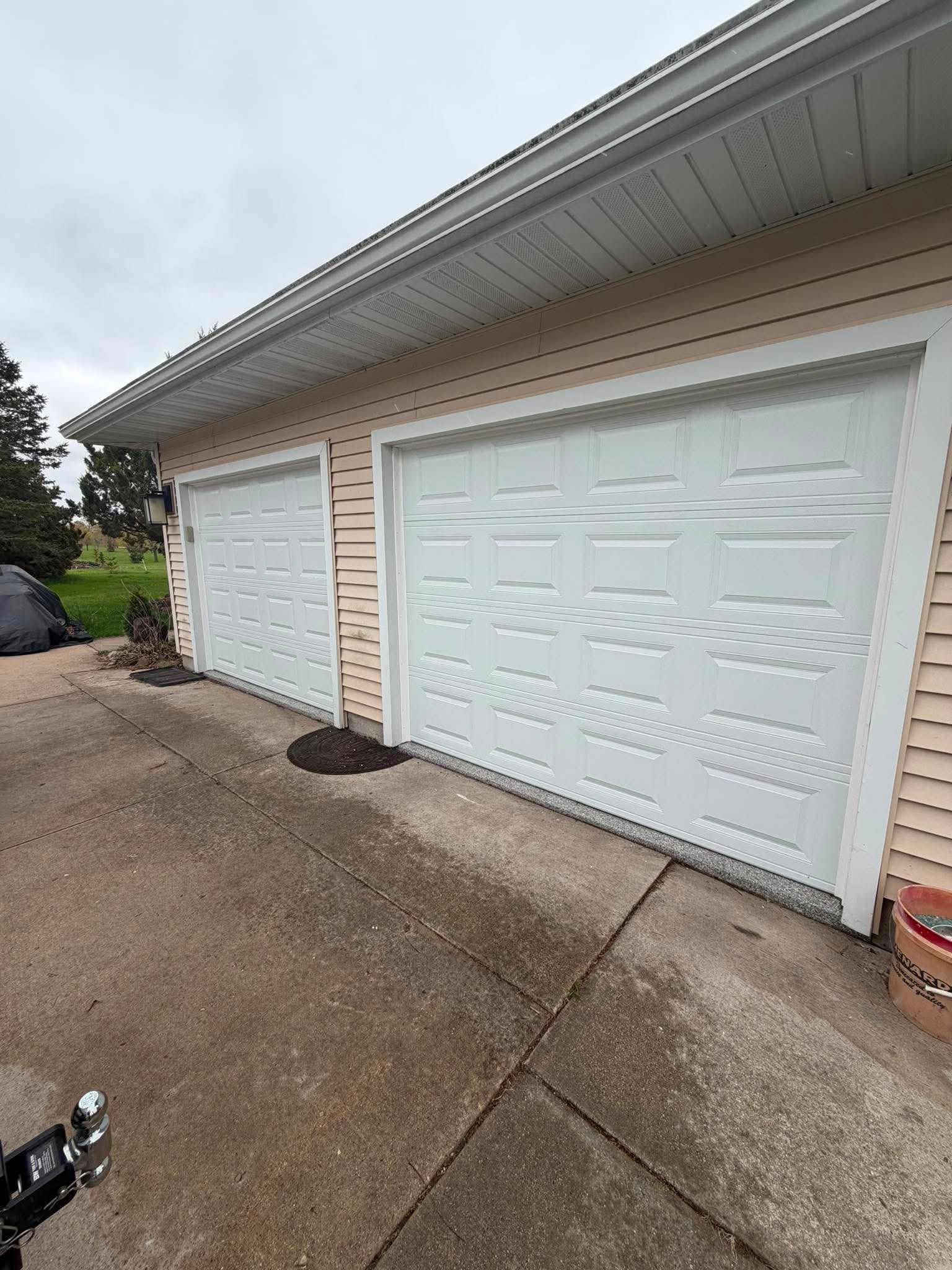 Two insulated residential garage doors